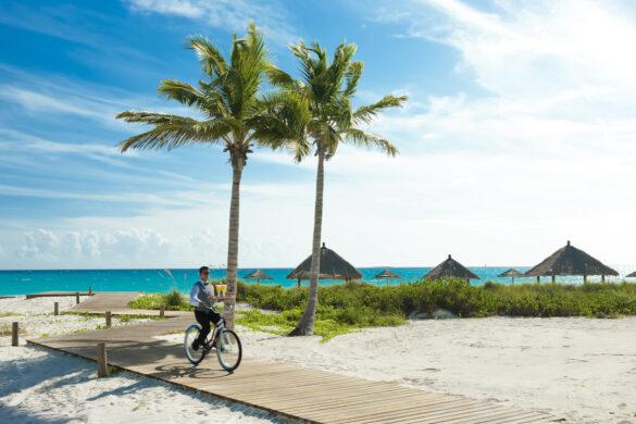 Sandals Emerald Bay Butler on Bicycle