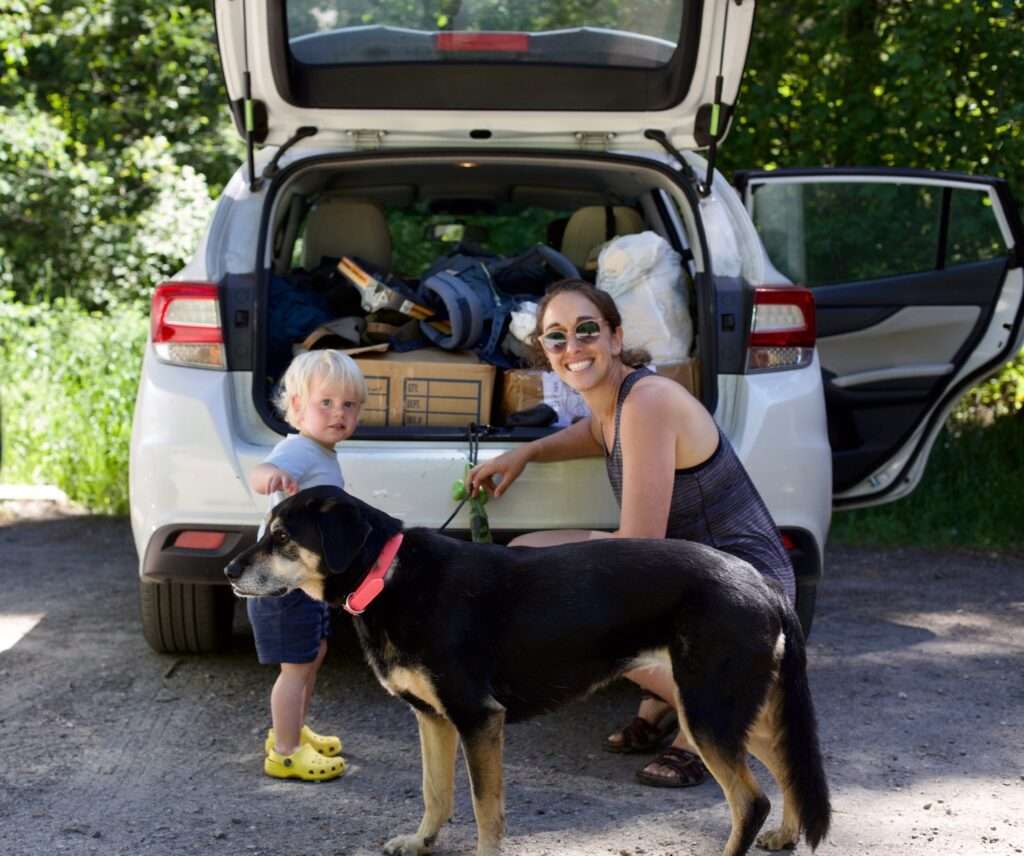 Jocelyn travelling with her toddler and pup