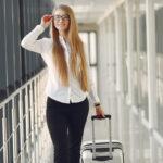 Woman at the airport travelling for work with eye glasses
